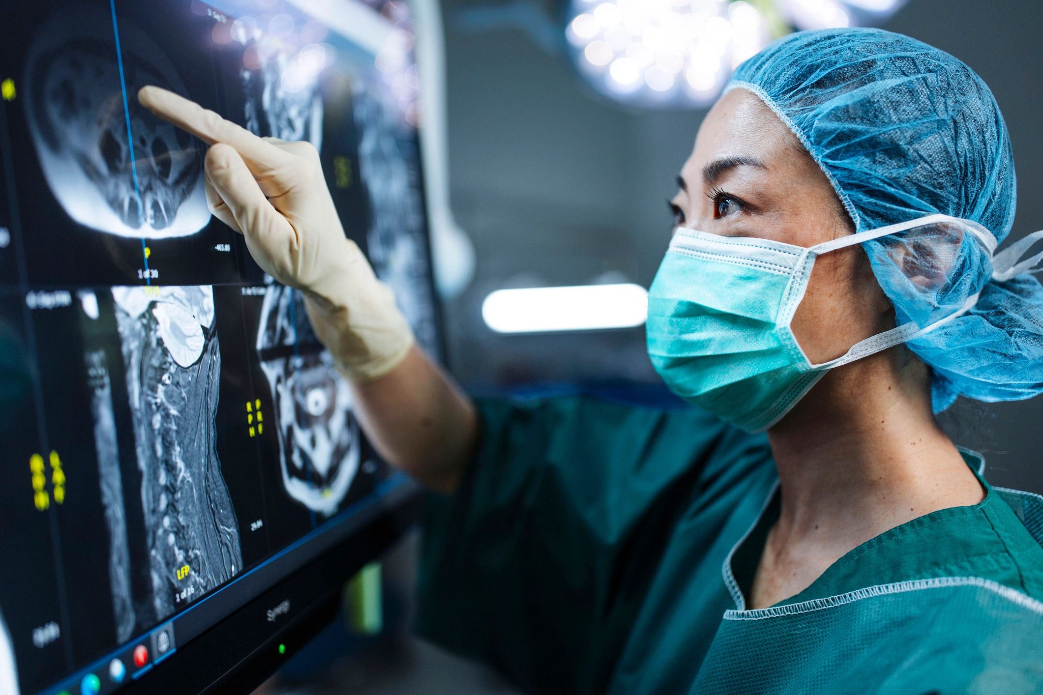 Healthcare professional reviewing diagnostic imaging