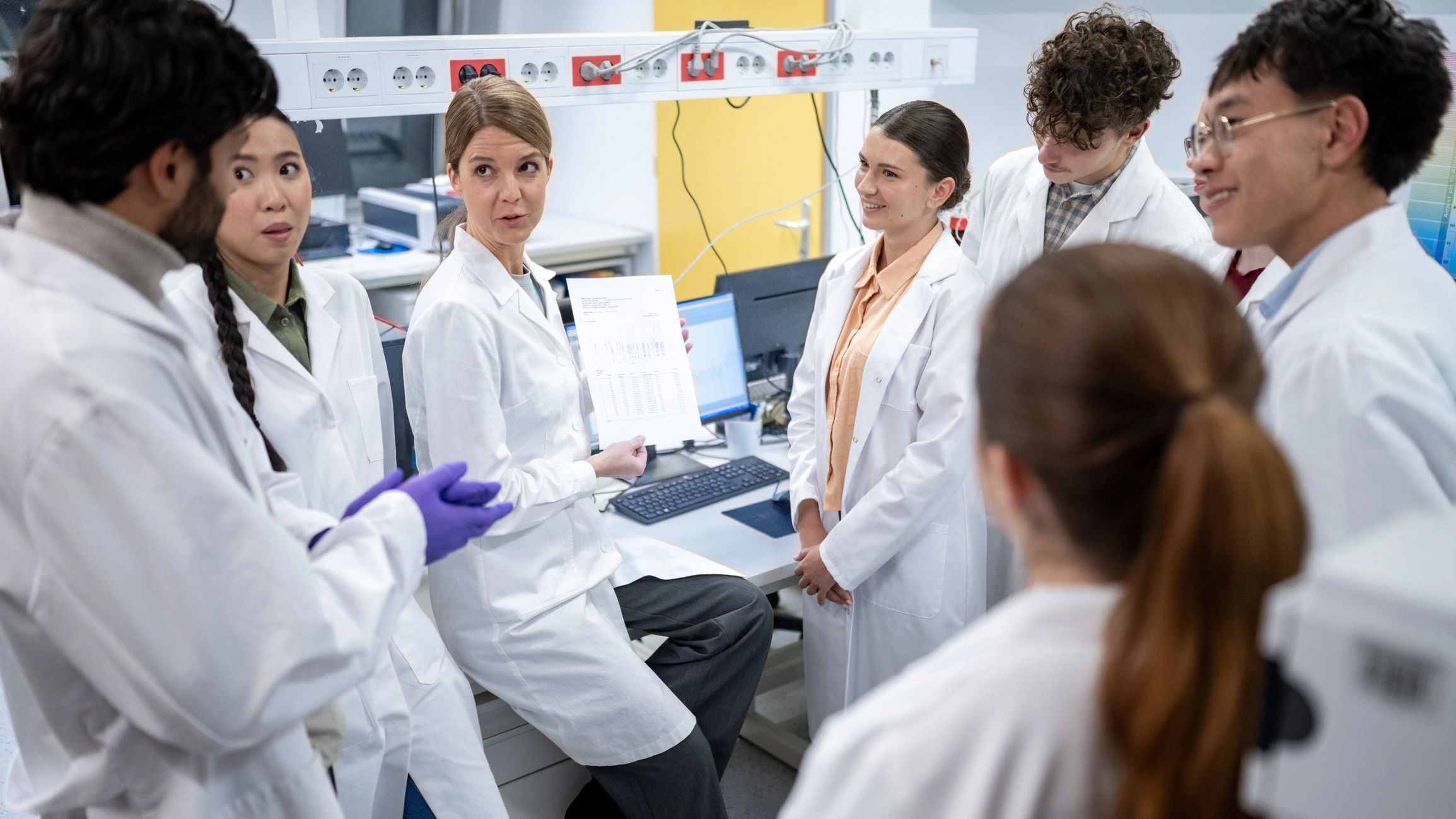 Scientists collaborating in a modern diagnostic laboratory