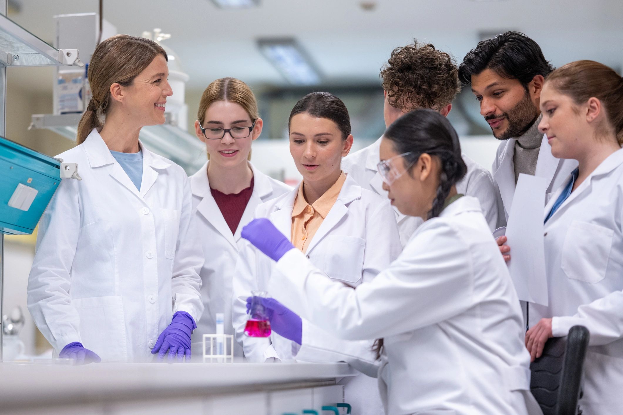 Biotechnology team collaborating on laboratory research